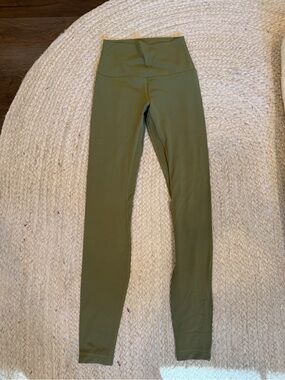 lululemon olive green leggings with logo tag